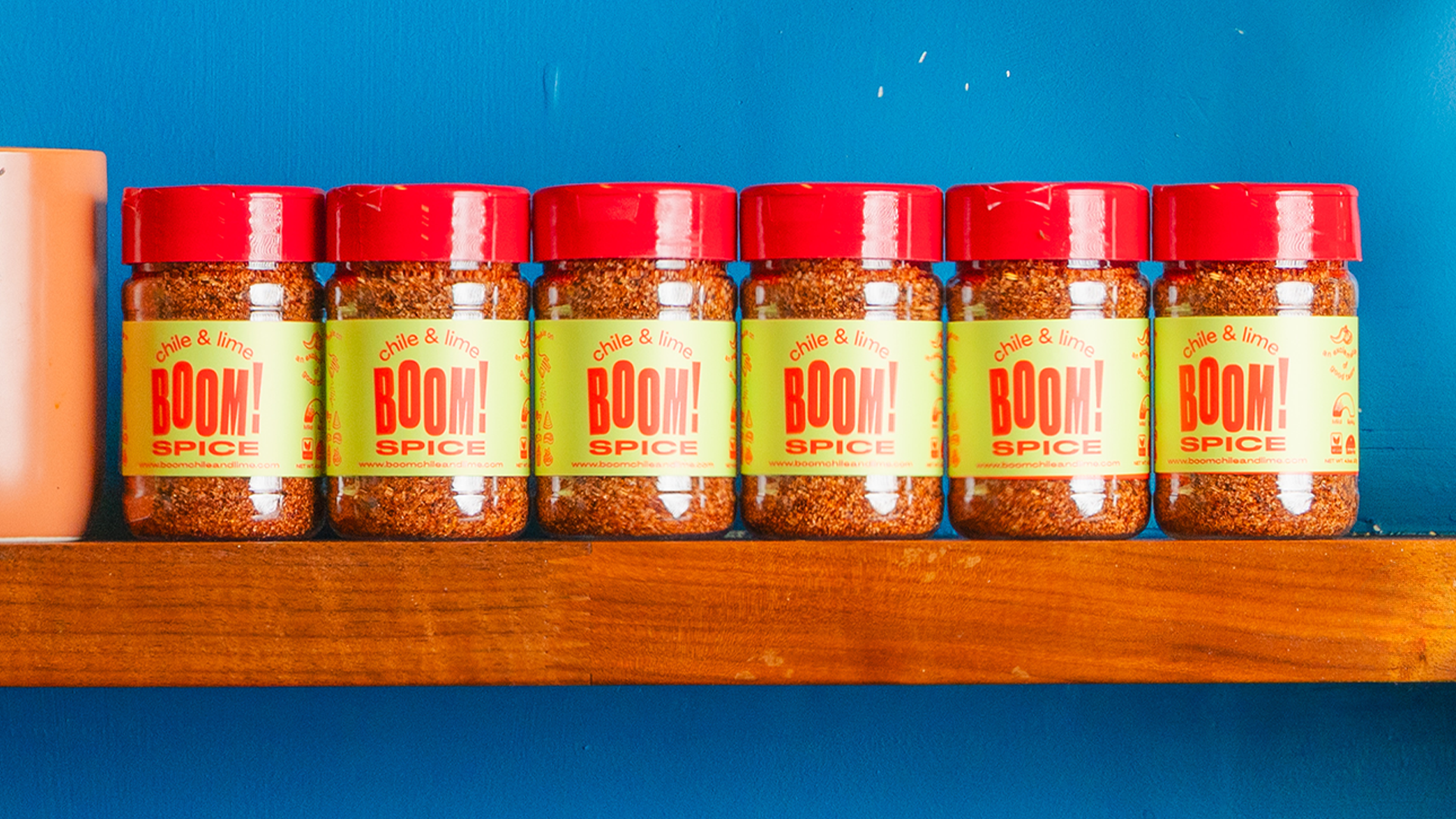 A collection of Boom spices on a shelf